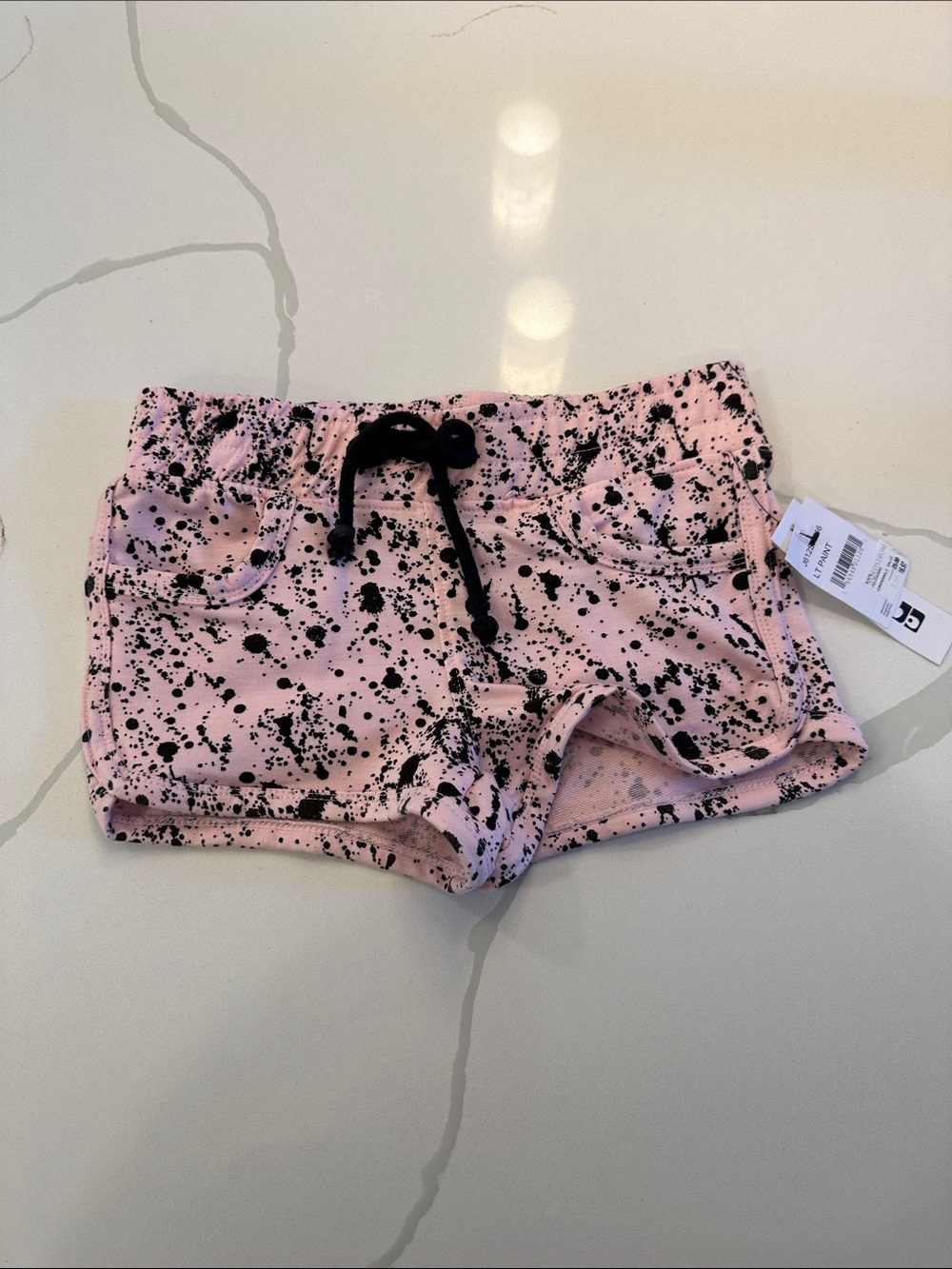 NWT Joe’s the dolphin short light pink black paint splatter size 4